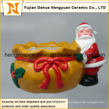 Keramik Santa Claus Nestled in der Nähe der großen Tasche, Weihnachtsdekoration